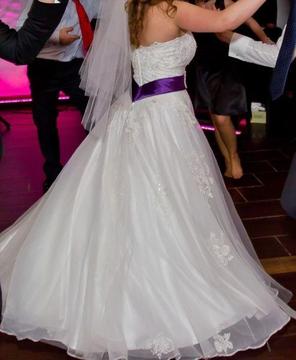 Sweetheart neckline princess style wedding dress with belt