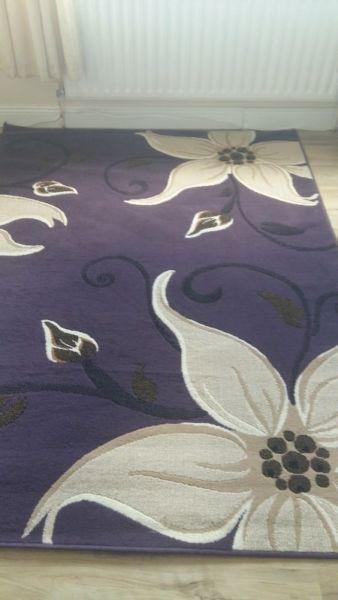 Purple cream black rug
