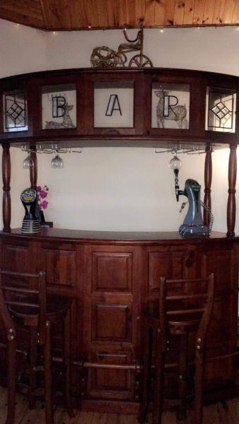 House bar with pump and stools