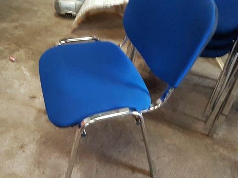 11 blue and chrome stacking chairs