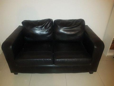 Two seater leather couches