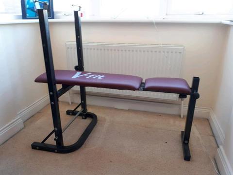 Weights bench with bars and weights