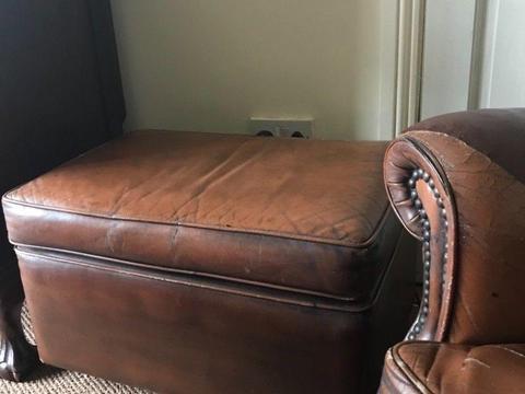 2 vintage leather armchairs and foot stool