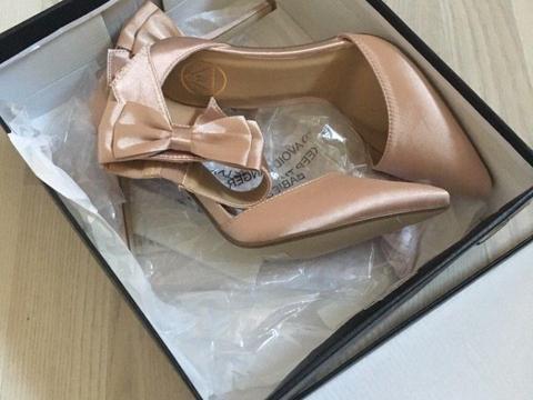 Gorgeous satin pink heels with bow ankle detail