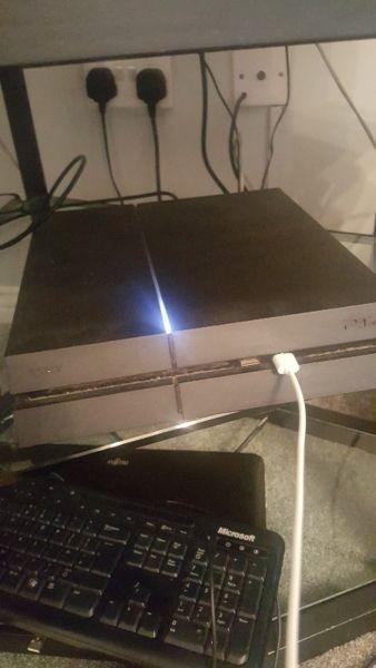 PS4 with a bundle of games and headset