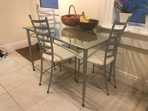 Glass dining table and 3 chairs