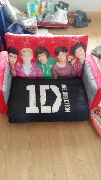 1 Direction sofa bed, 2 new single duvet covers and shoulder bag