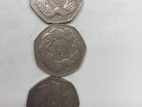 50p ring of hands coins