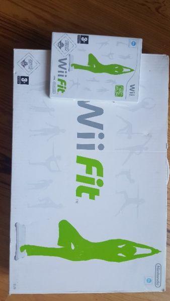 Wii console and Wii fit; accessories plus games
