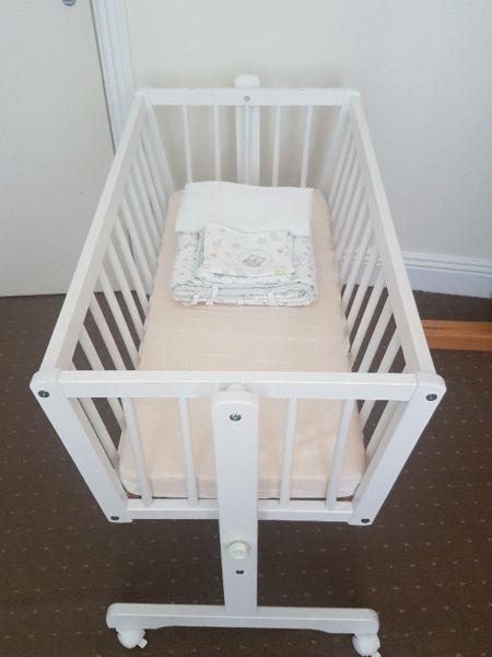 White baby crib