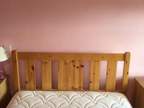Double bed with wooden frame