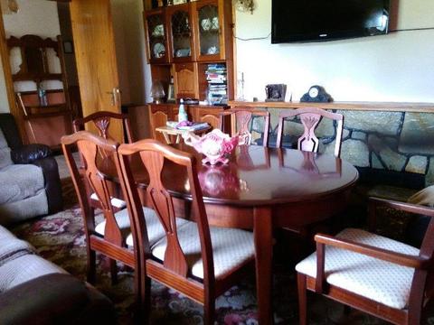Rosemore expanding table and six chairs for sale