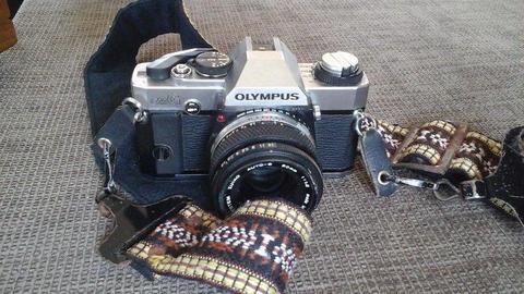 Olympus OM G Film SLR camera with accessories