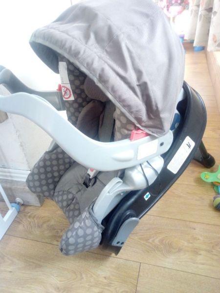 Car seat with base and raincover