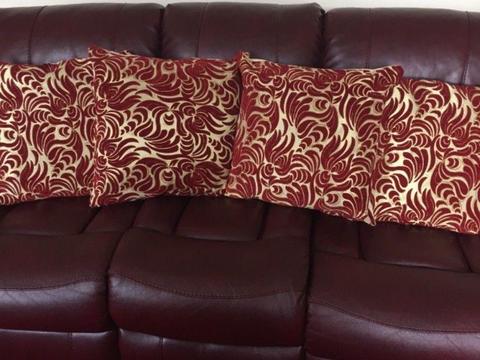 Four Red and Gold Cushions