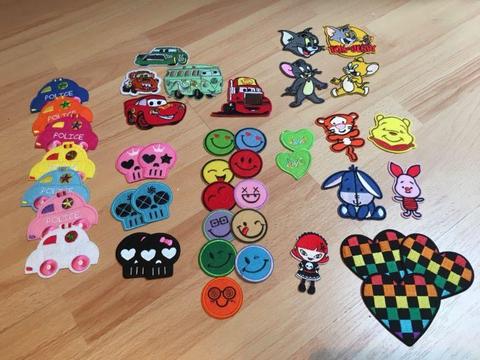 Bundle of 43 iron-on patches, appliqués