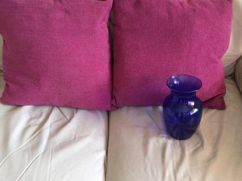 Cushions and vase