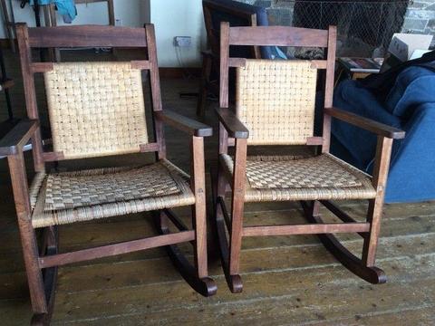 2 wooden rocking chairs