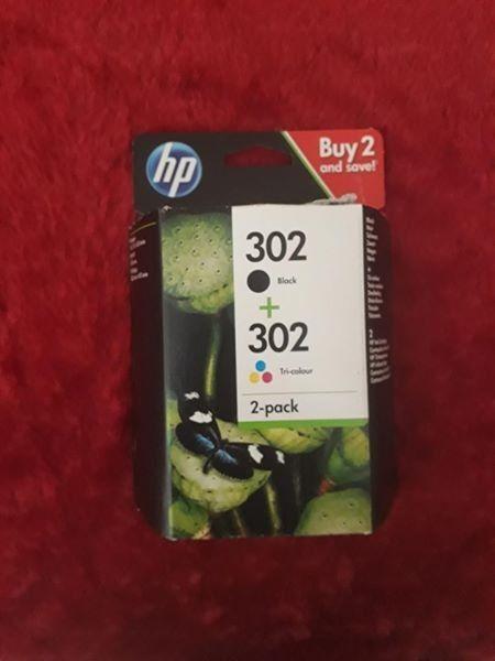 Ink cartridges 302 for an HP printer