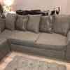 Grey corner sofa and large foot stool 