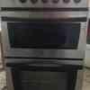 Fridge freezer, mains gas cooker, round pine table & 4 chairs 